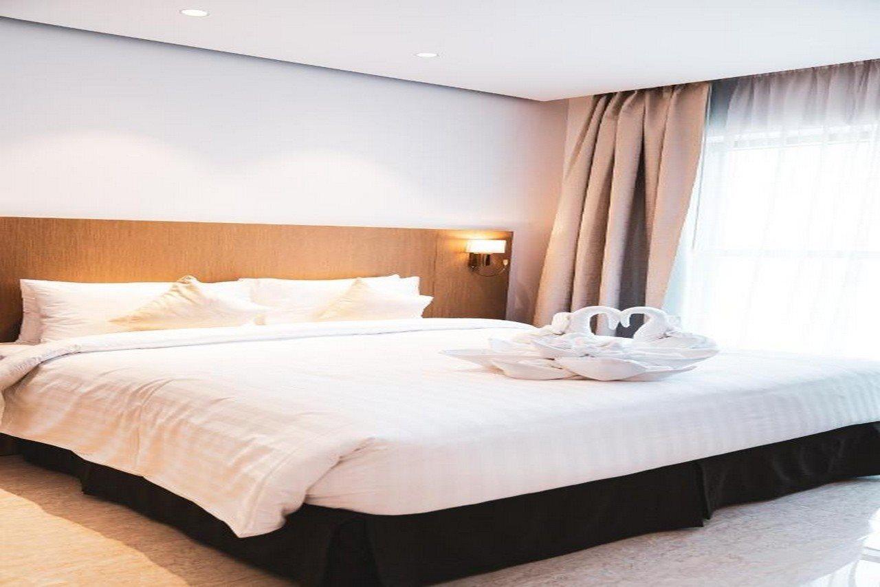 دبي He Hotel Apartments المظهر الخارجي الصورة A bed