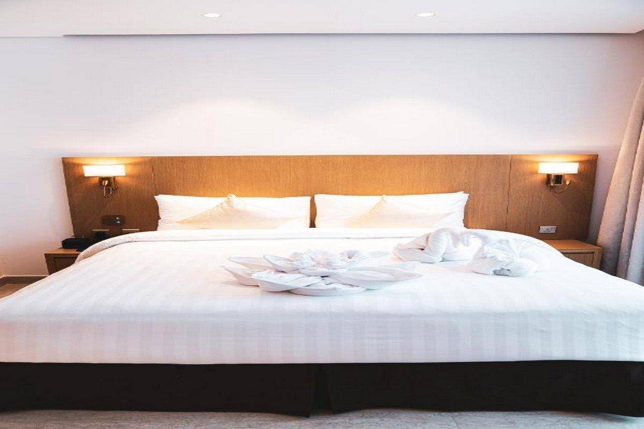 دبي He Hotel Apartments المظهر الخارجي الصورة A bed